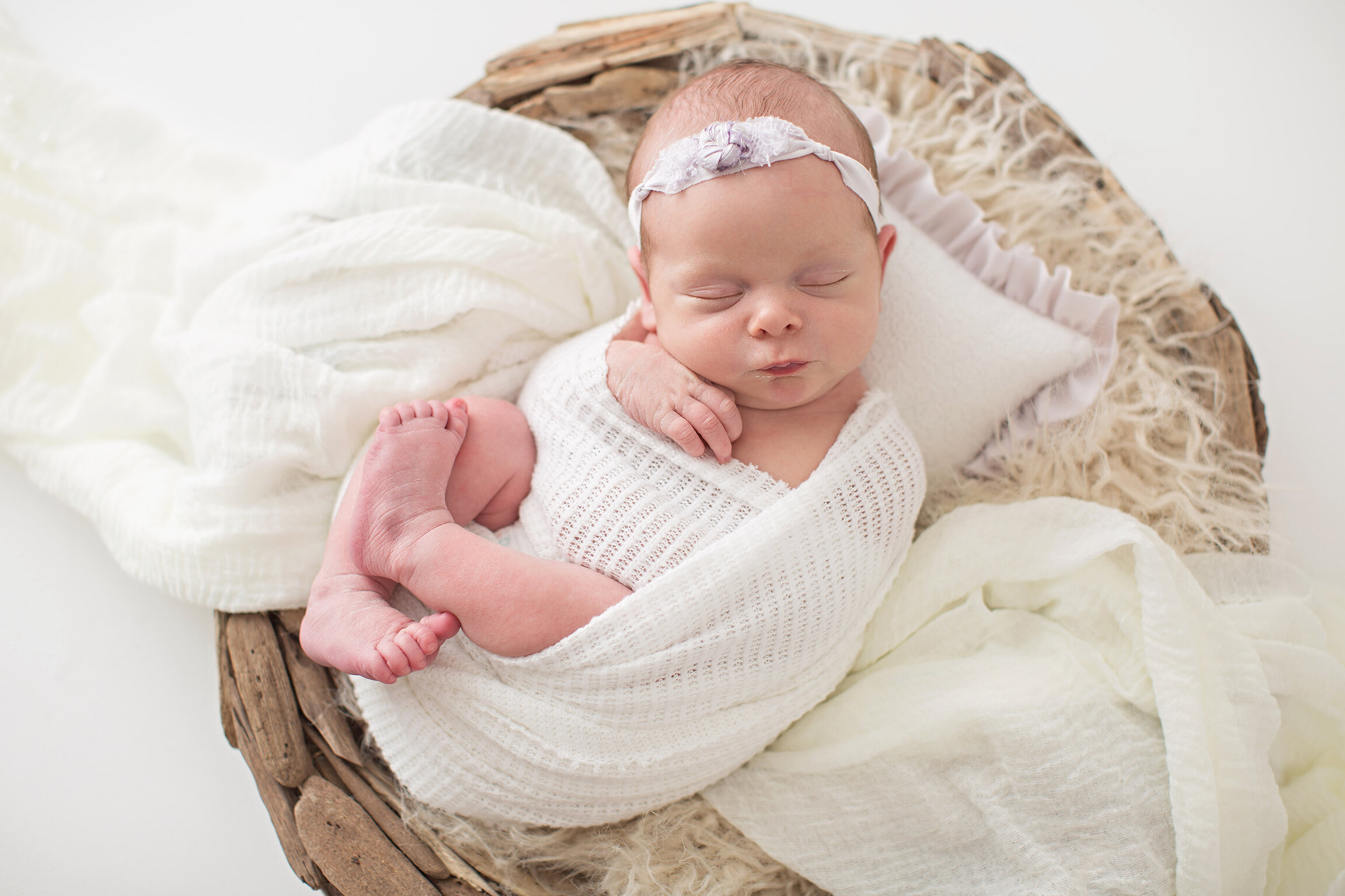 baby wrapped up newborn photo
