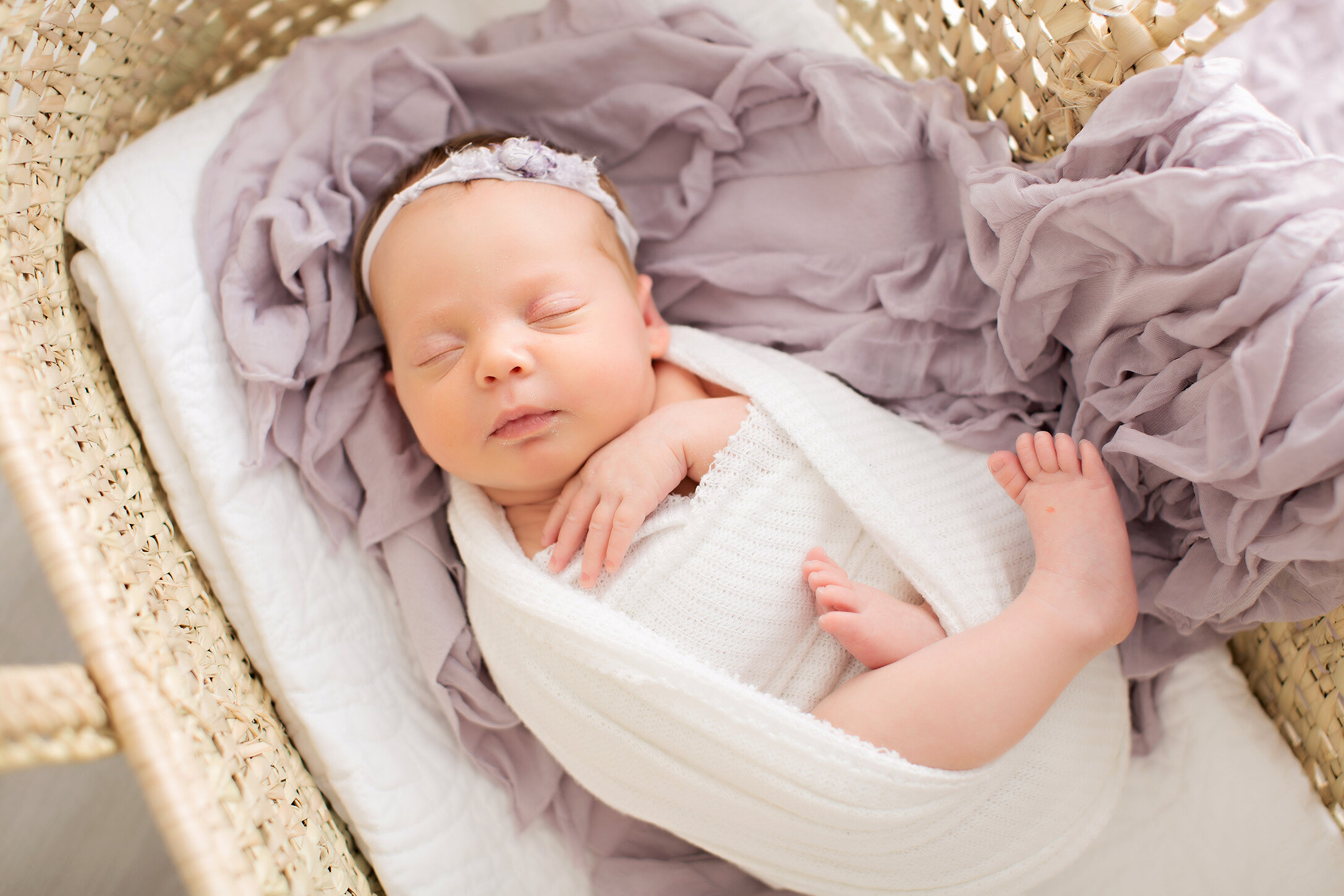 newborn girl in basinette philadelphia pa