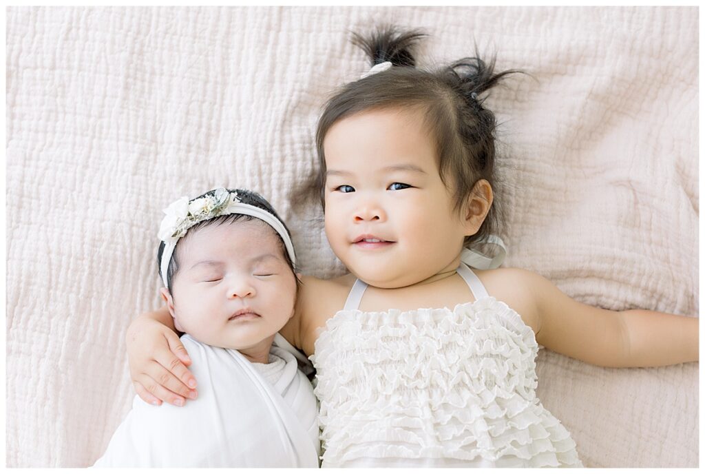 baby girl with big sister newborn photographer newtown pa