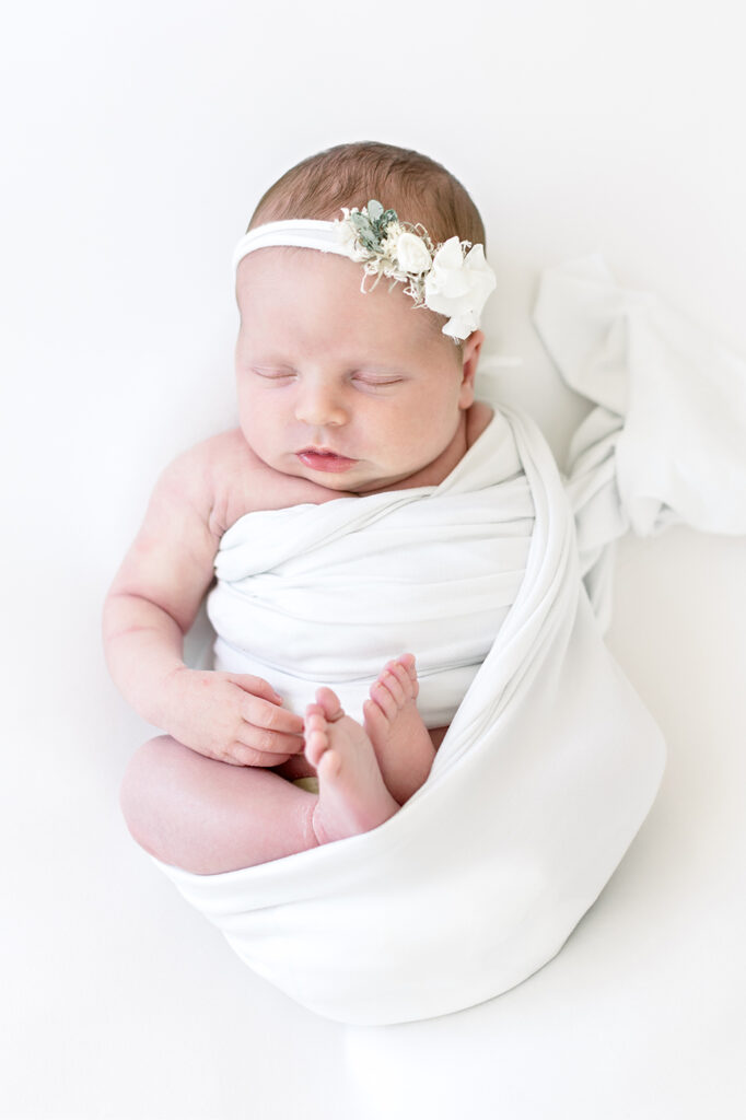 baby girl white swaddle newborn picture