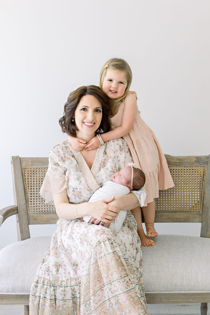 mom with her daughters newborn session