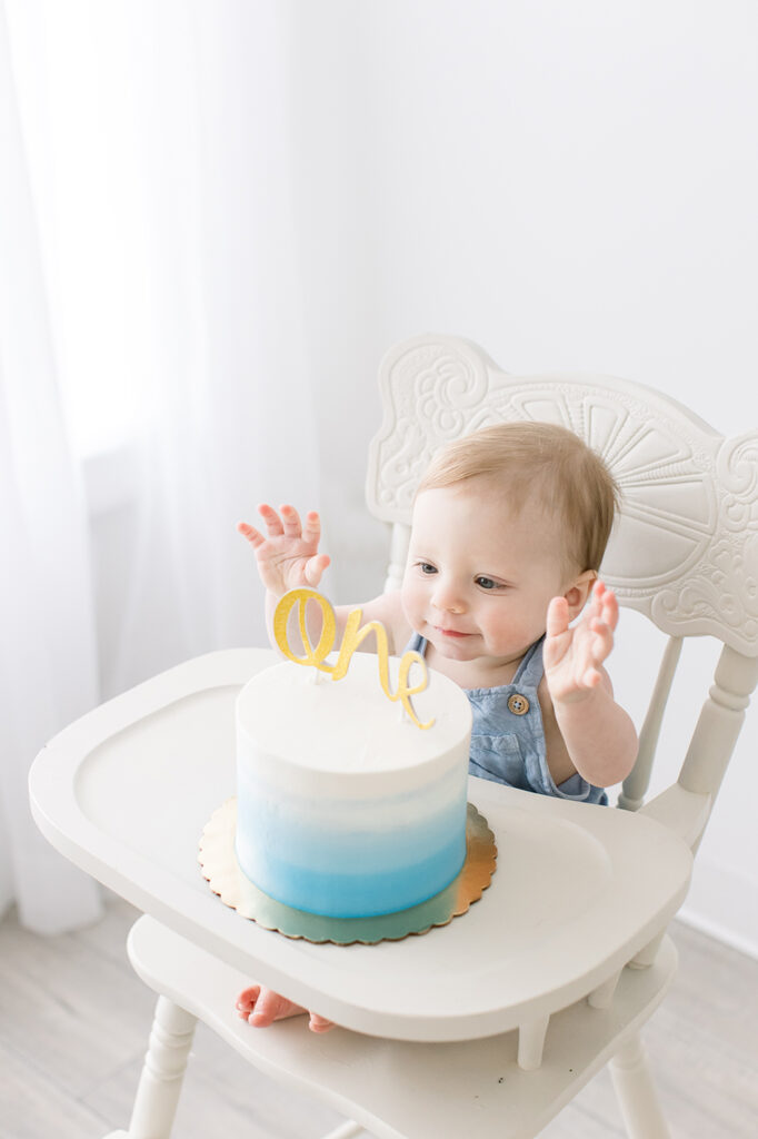 baby with blue first birthday cake newtown cake smash