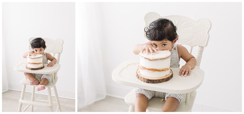 baby with cake in high chair 