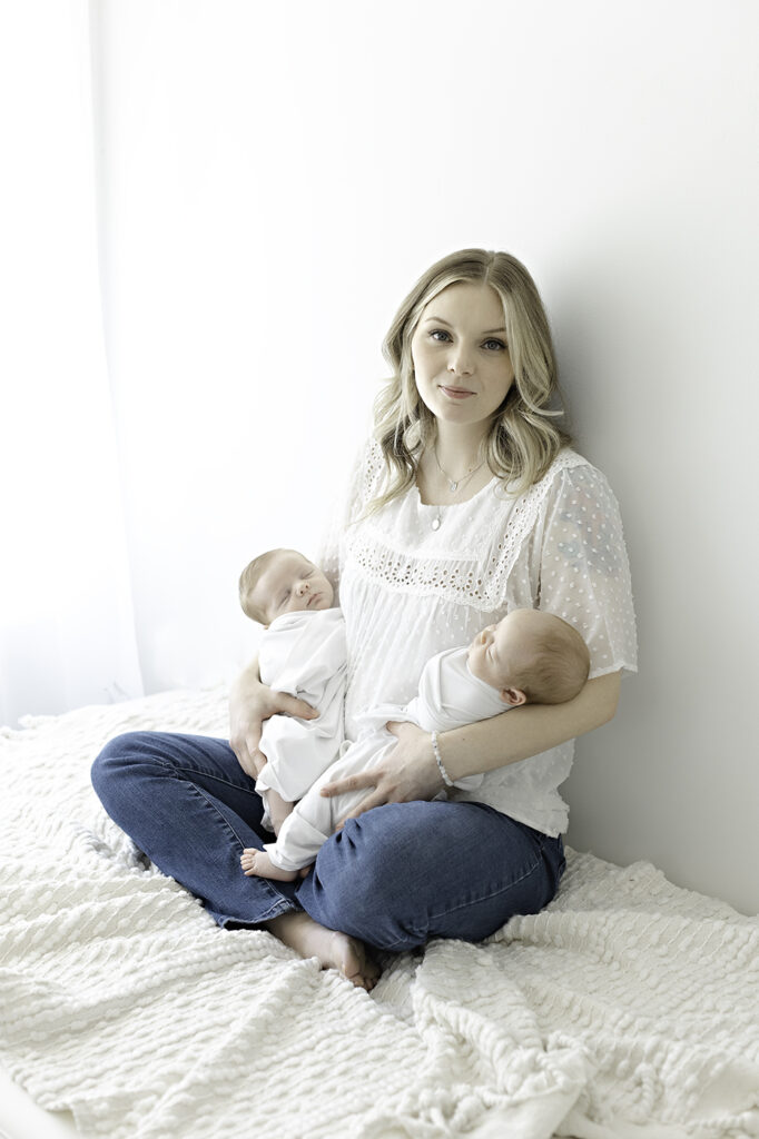 twin mom holding babies jeans casually dressed newborn photographer philadelphia