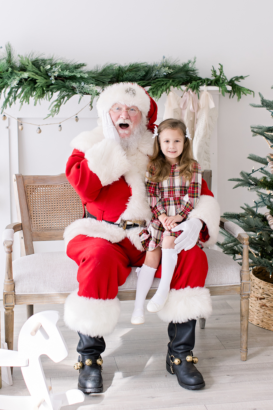 santa looking surprised with little girl holiday style guide Holiday and Santa Session style guide