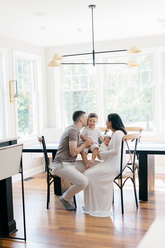 family of four at kitchen table