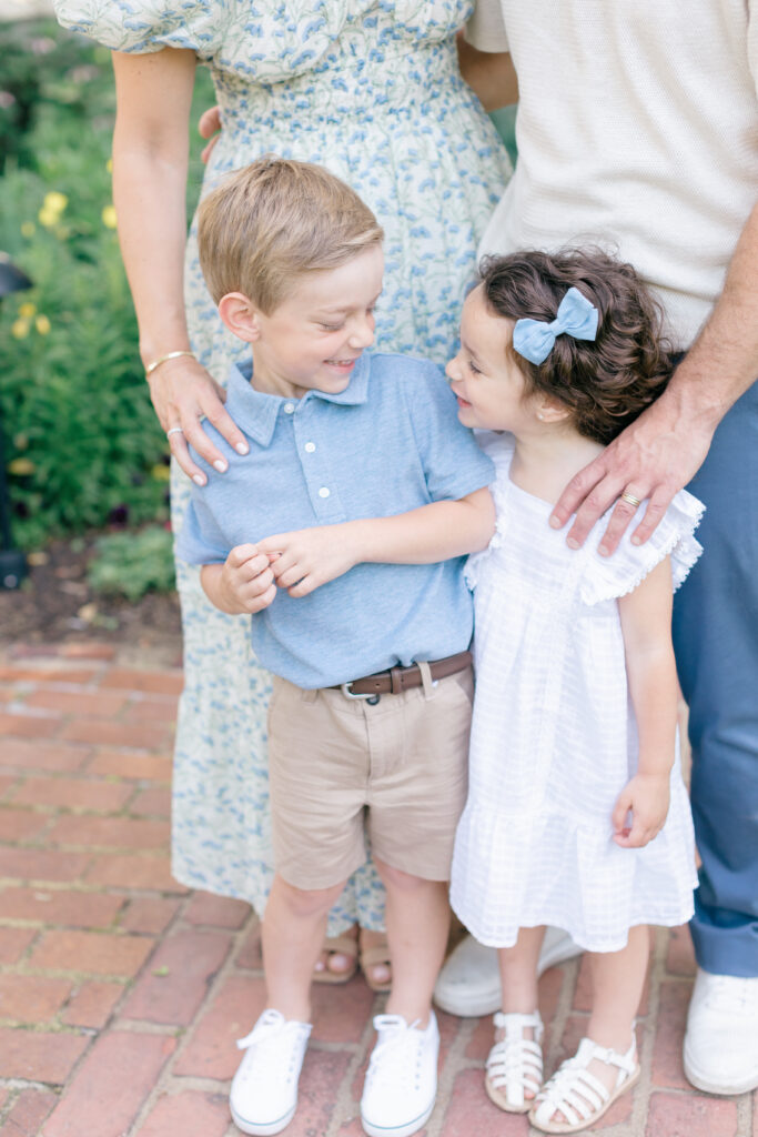 siblings laughing together family photos spring
