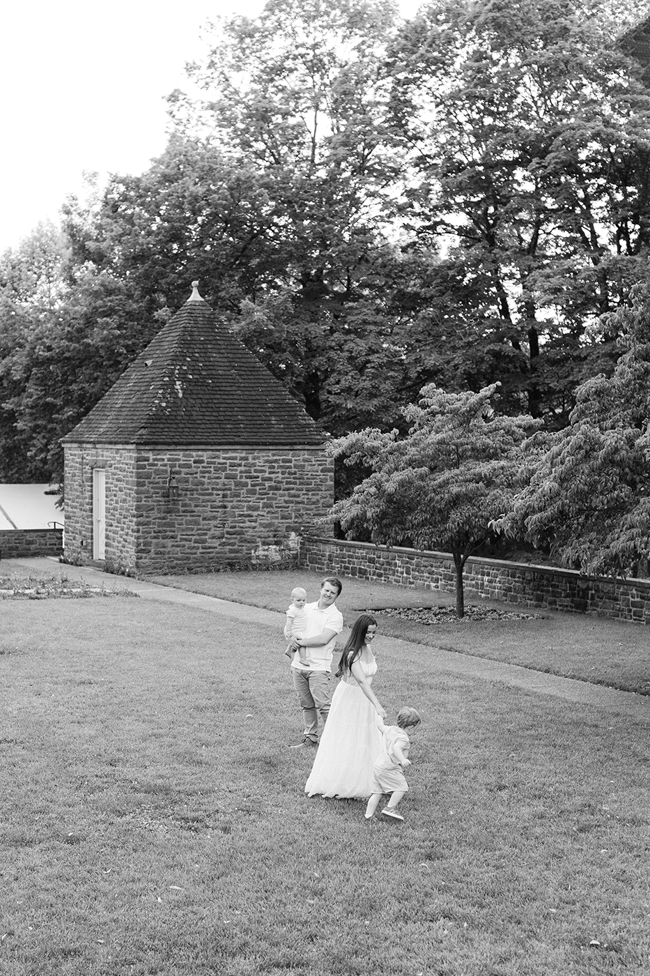 family playing together in field